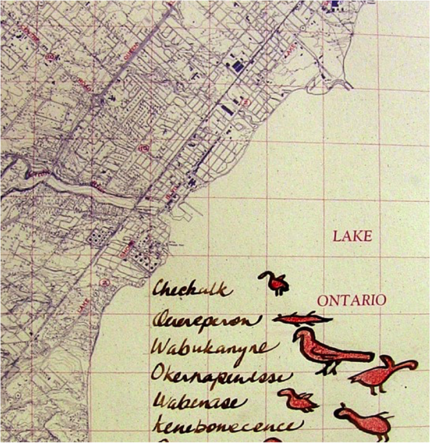 A section of Bonnie Devine's artwork, called 'Titled/Untitled'. The artwork depicts a modern map of Toronto, overlaid with local indigenous language and iconography.