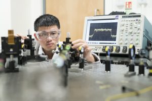 A researcher investigating with cameras