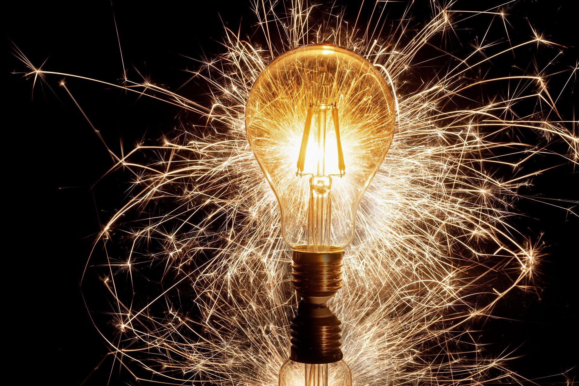 Lightbulb with sparks coming out of it