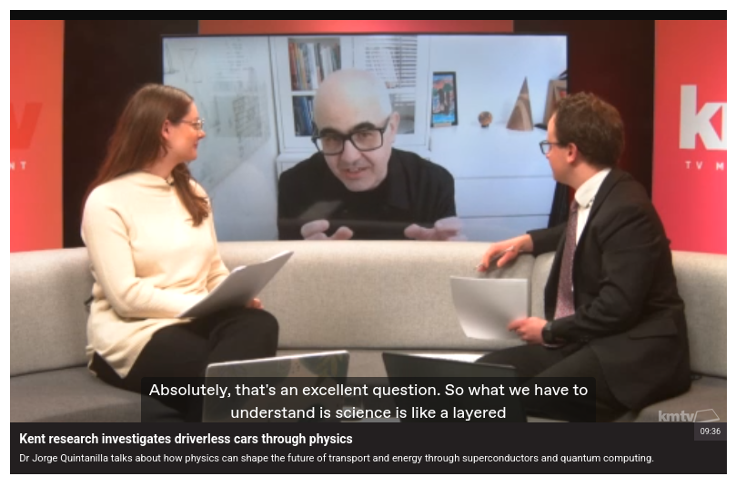 Two presenters interview an online guest in a TV studio